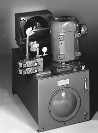 fig. 2. this modular power unit demonstrates a trend in design: mounting the electric motor vertically with the pump submerged in hydraulic fluid. this technique reduces leakage, noise, and floor space required.